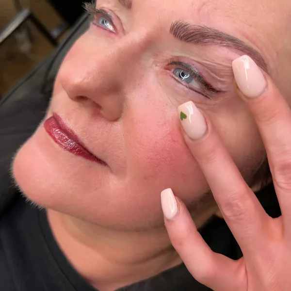 Natural lash line enhancement on brunette client — fresh tattoo by Lorraine Gold Coast